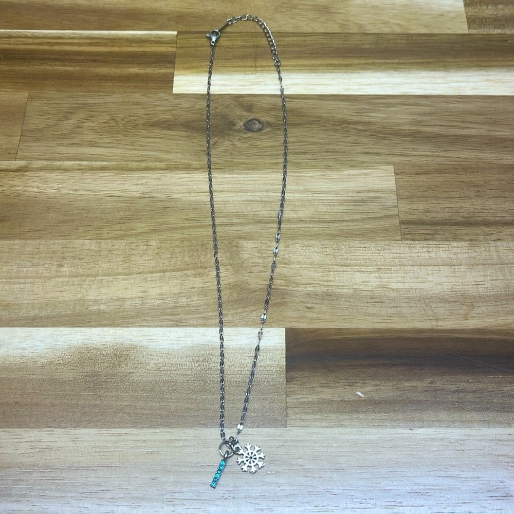silver necklace with winter wonderland charms